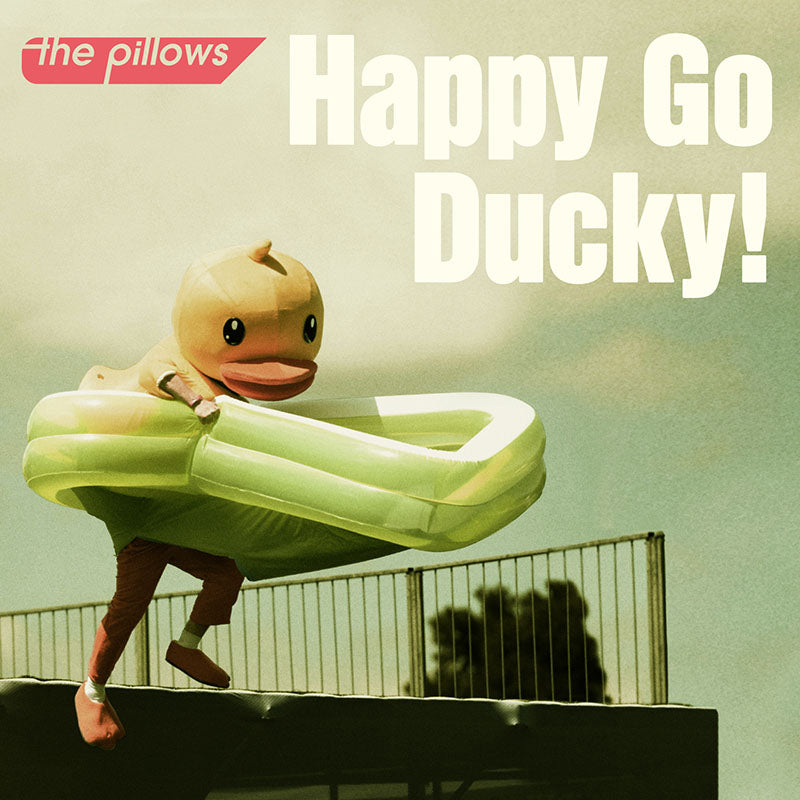 the pillows Happy Go Ducky! single over art, featuring a very happy duck. Japanese rock band