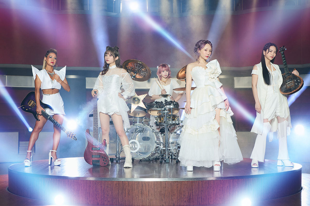 LOVEBITES band, featuring all members of the Japanese heavy metal girl band dressed in white